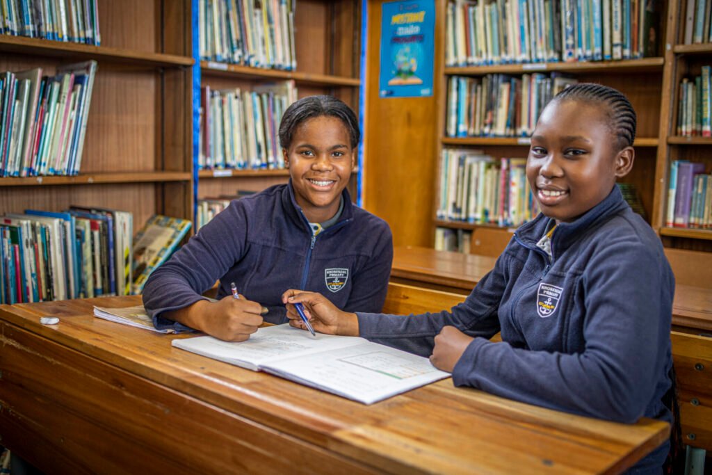Two Bright Start Learners smiling
