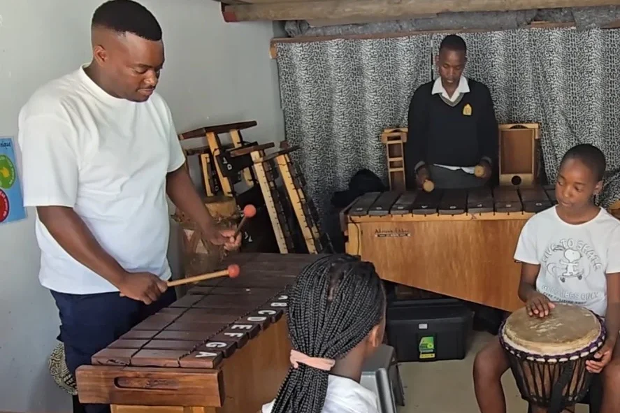 Uthando (Love) KMA students playing instruments